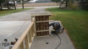 installing cross braces for diy deer stand platform