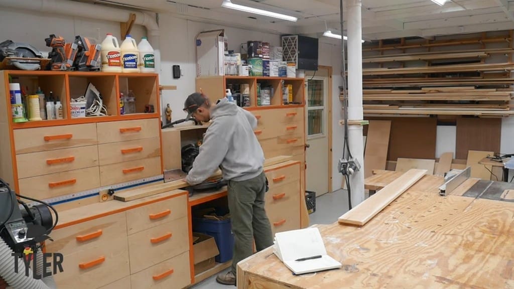 man cutting spalted maple with miter saw