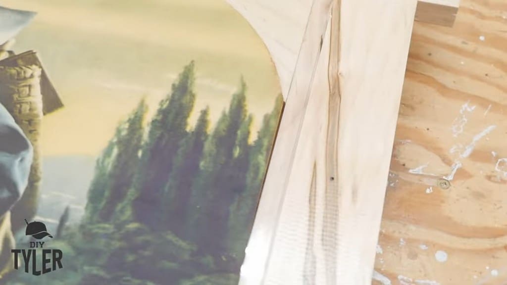 close-up of edge of painting and square picture frame