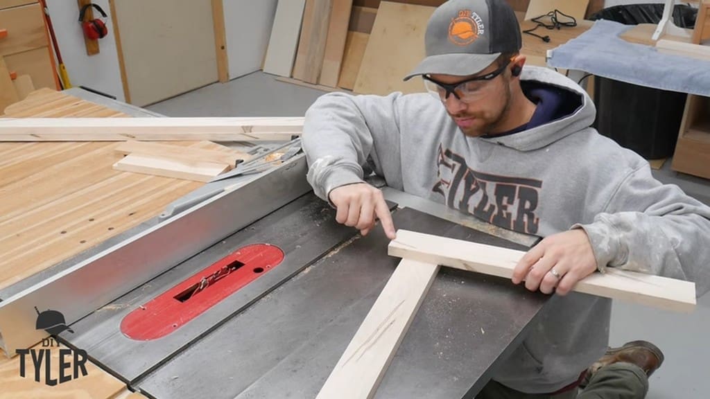 man demonstrating spacing for dado cut