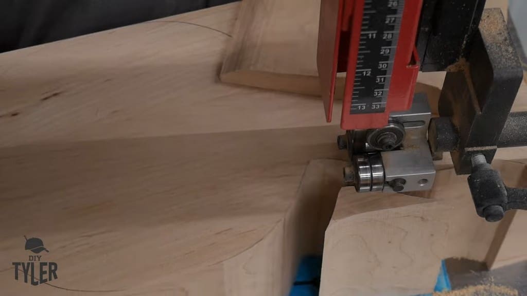 man running hard maple wood through bandsaw