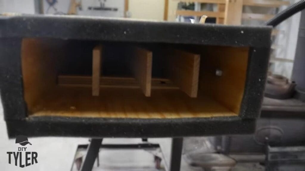 ash wood pieces inside of steam box