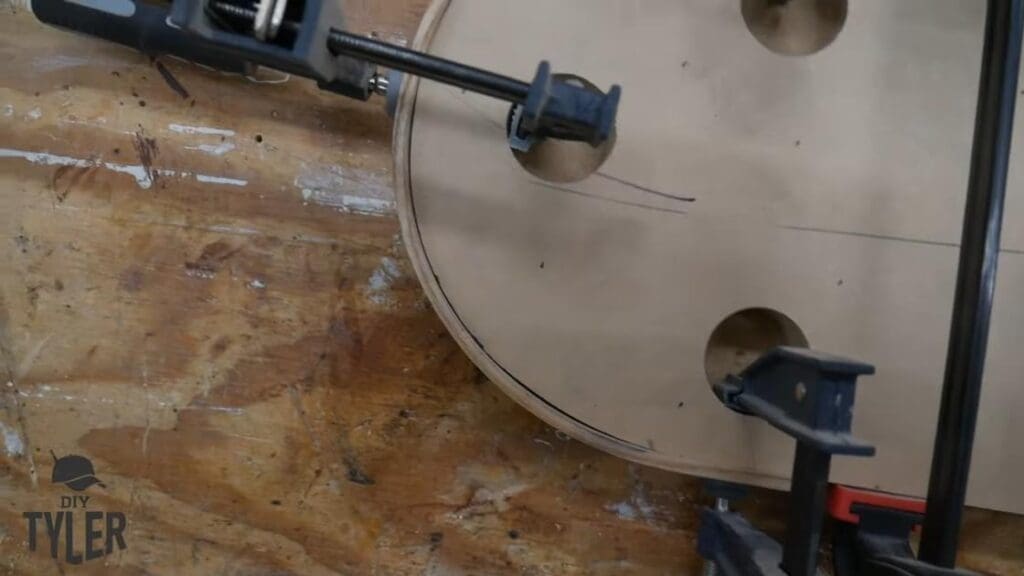 f-clamps holding bent steam-treated wood onto mold